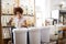 Woman Filling Container With Dishwasher Powder In Plastic Free Grocery Store