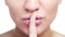 Woman, finger on lips and secret for beauty and skincare, silence for privacy and confidential on white background. Face