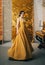 Woman finger wave hairstyle long elegant evening golden dress smiling cute face