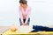 Woman in first aid course practicing heart massage