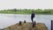 Woman Fishing on Fishing Rod at river.