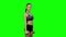 Woman fitness instructor doing exercises. Green screen
