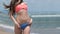 Woman with flat stomach wear bikini, close up