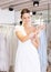 Woman flaunting dressed in wedding gown
