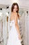 Woman flaunting dressed in wedding gown