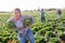 Woman fleeing farm field with stolen cabbages