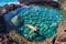 Woman floating in natural pool