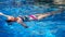 Woman floating relaxed in a swimming pool with crystal clear water