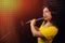 Woman flutist playing the silver flute. Record wind musical instruments with a professional microphone. Girl flute player plays in