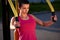 Woman focussed while exercising upper body.