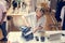 Woman folding jeans in clothing store