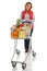 Woman food shopping with trolley isolated