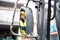 Woman forklift truck driver in an industrial area.