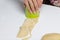 A woman forms dumplings with a glass. Extrudes the required shape in the dough. Cooking dumplings with blueberries and cherries