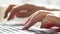 Woman freelancer working on laptop at home-office. Close up of female hands. Businesswoman writing business letter at
