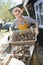 Woman with fresh oyster harvest