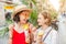 Woman friends having fun and eating ice cream