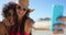 Woman, friends and smile for beach selfie, travel or summer vacation together in the outdoors. Happy women relaxing and