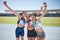 Woman, friends and winner in running sport for medal, marathon or athletics at the stadium track outdoors. Group of