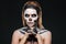 Woman with frightening skeleton makeup