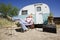 Woman in front of Travel Trailer