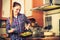 Woman frying frozen vegetables. Stir fry.