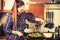 Woman frying frozen vegetables. Stir fry.