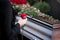 Woman at Funeral with coffin