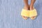 Woman in fuzzy slippers on carpet, closeup