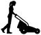 Woman gardener or farmer silhouette mows the grass with a lawn mower