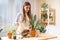 Woman gardeners watering plant