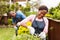 Woman gardening with husband