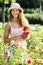 Woman gardening with roses