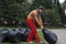 Woman gathering garbage in the park