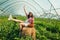 woman gathering strawberries at the farm