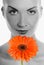 Woman with gerbera flower