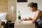 Woman getting having her green smoothie after training.