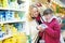 Woman and girl making shopping