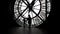 Woman and girl silhouettes standing in front of large clock, Paris, France. Unrecognizable people overlooking Paris.