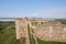 Woman girl traveler in Mourao castle towers and wall historic building in Alentejo, Portugal