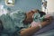 Woman giving birth in maternity hospital. Pregnant woman breathing during contractions
