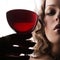 Woman with glass red wine