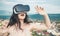 Woman with glasses of virtual reality. Woman getting experience using VR-headset glasses. Visual reality concept