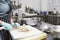 Woman in gloves cutting fresh mushrooms, clean take away kitchen