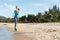 Woman goes in for sports jogging on beach