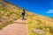 Woman going up on mountain stairs at Madeira Island