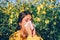 Woman got nose allergy, flu sneezing nose. The girl suffers from pollen allergy during flowering and uses napkins