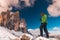 Woman with GPS navigator in hand Dolomites Alps