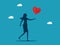 woman grabs the floating heart. business love and trust