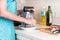 Woman grating cheese on a grater